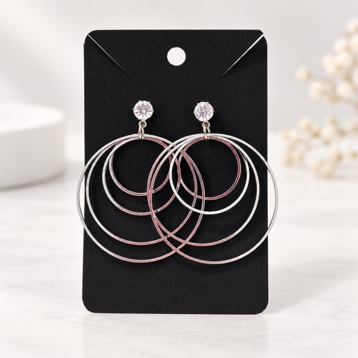 Boucles d'oreilles géométriques argentées à anneaux