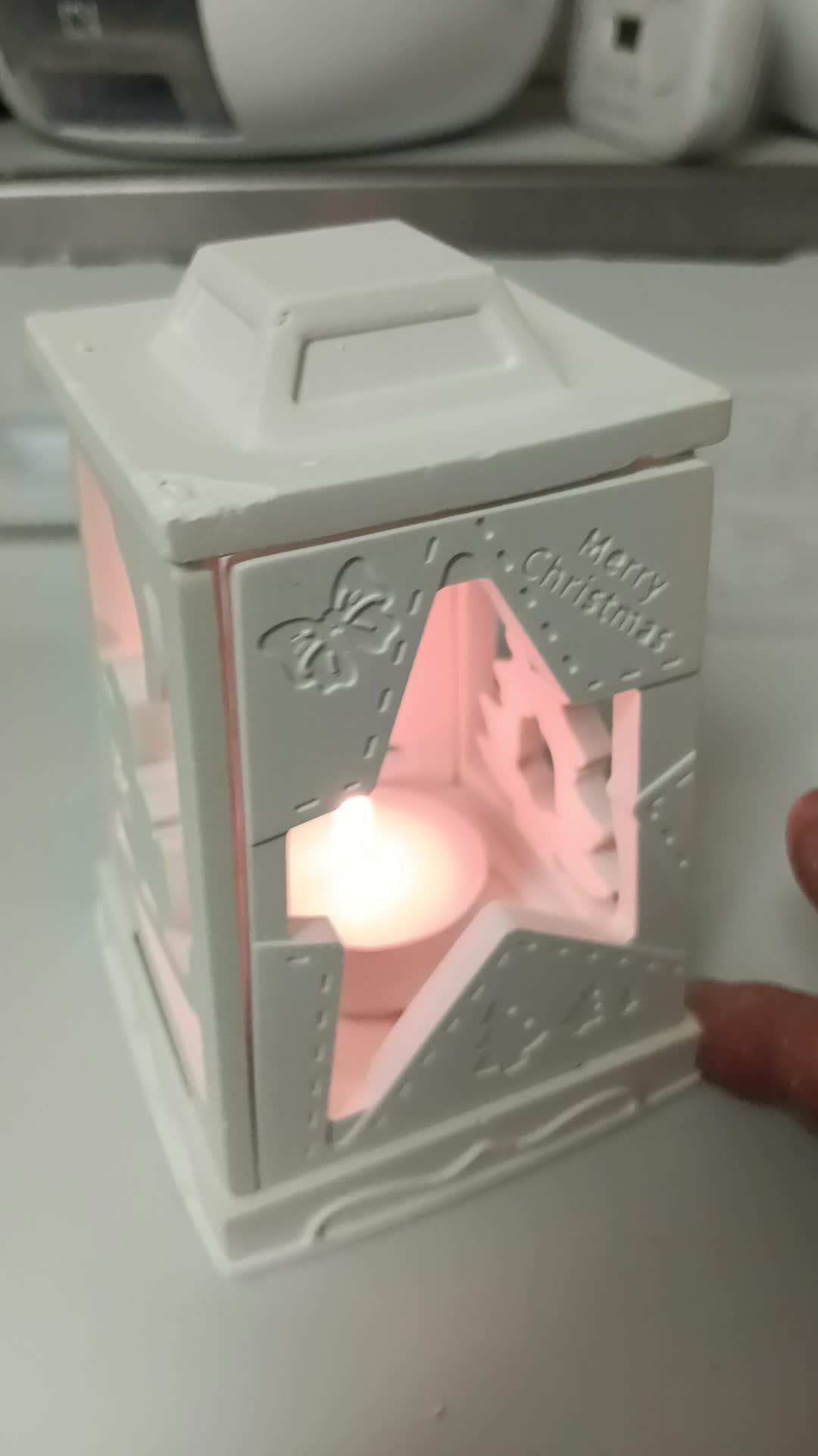 Lanterne de Noël blanche allumée, face étoile et Père Noël